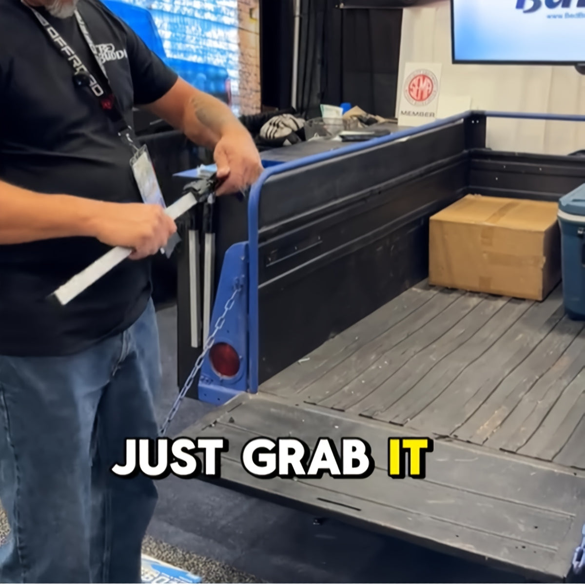 A Robust Stainless Steel Telescopic Grabber for Truck Beds, Featuring a Retractable Handle. This Heavy-Duty Tool Is Designed for Cargo Retrieval, Making It for easy to Lift And Move Heavy Items. It Serves As a Practical Accessory for Trucks with a D
