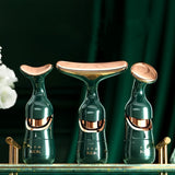 04 Dark green multifunctional beauty massager with 3 replacement heads for face + neck + eyes