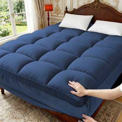 Mattress Pad shown in the navy, Twin (39in×75in) option