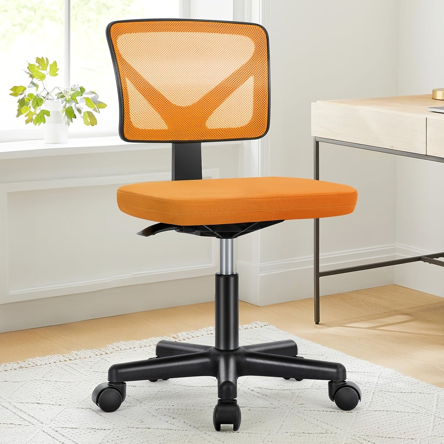 Office Chair shown in the Orange Mesh Chair option